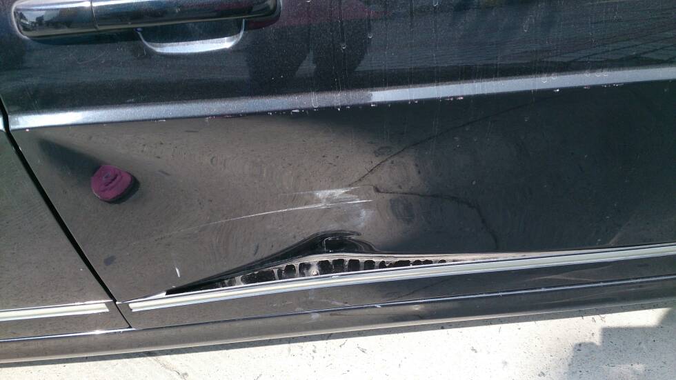车门撞凹了修复多少钱,车门撞凹了修复多少钱一次-第2张图片